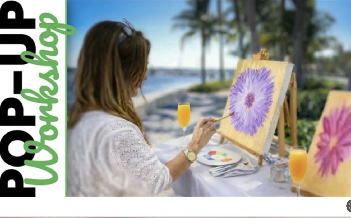 Painting at a pop-up workshop by the water